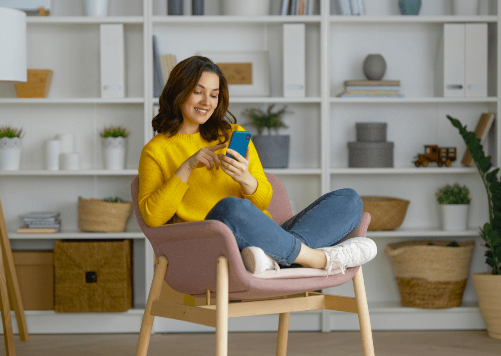 Women on a chair with phone